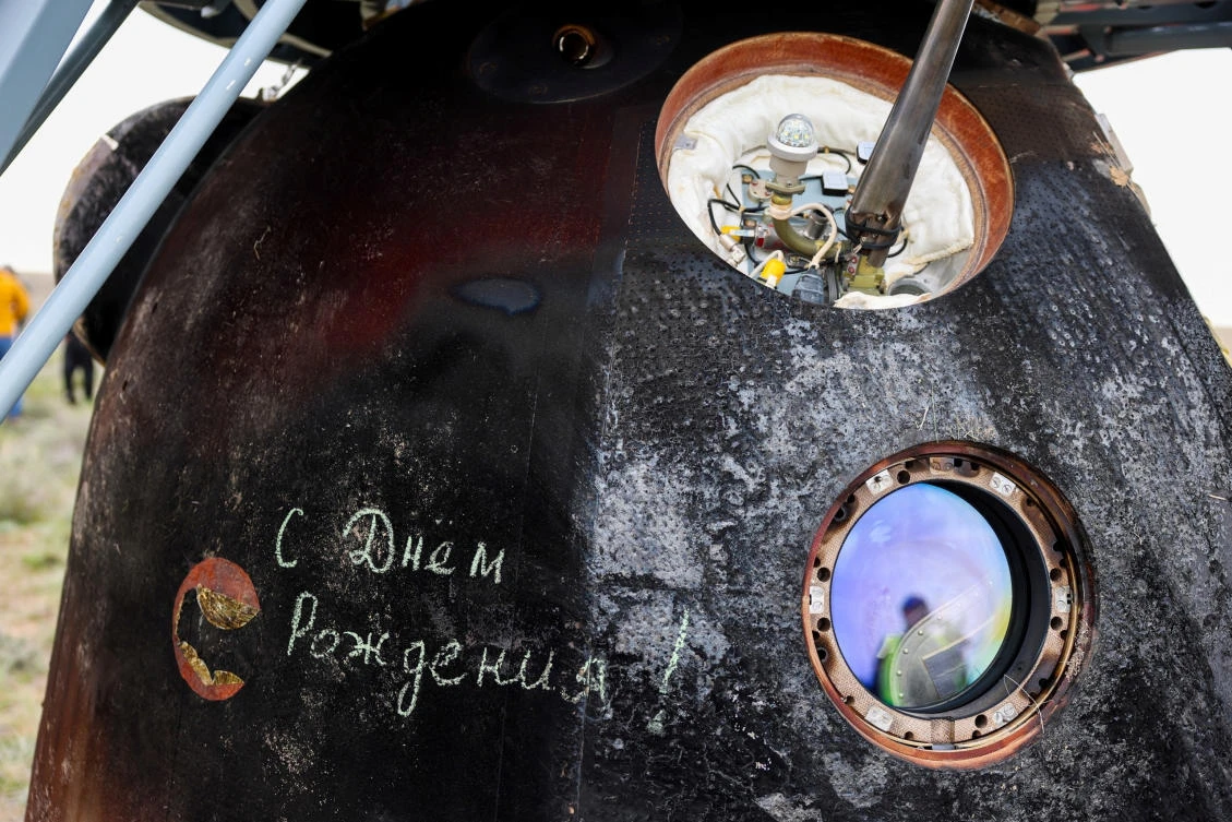 The message “Happy Birthday!” is written on the landed Soyuz MS-26 space capsule in celebration of the birthday of NASA astronaut Don Pettit, in a remote area near Zhezkazgan. Cake, gifts and a low-key family celebration may be how many senior citizens picture their 70th birthday. (REUTERS)