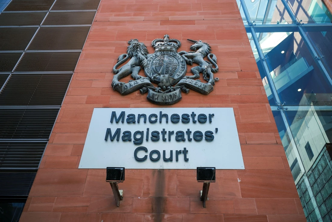 A logo of the Manchester Magistrates' court in Manchester, UK. (Reuters)