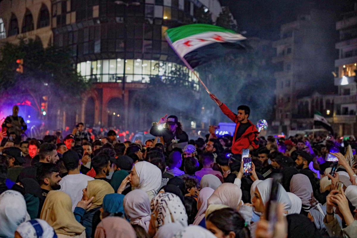 People celebrate in Damascus on May 13, 2025 after hearing the news that President Trump was easing US sanctions on Syria. (AP)