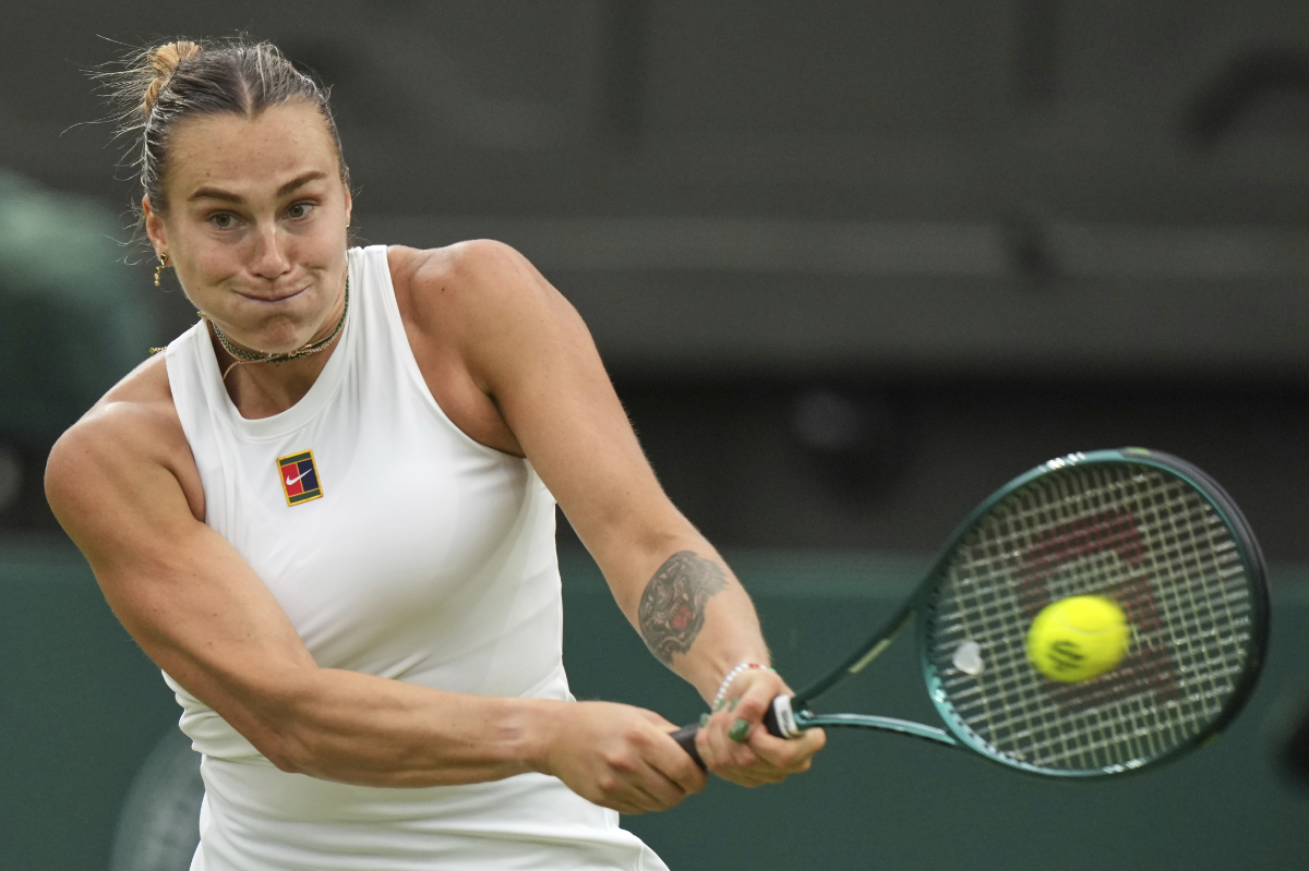 Aryna Sabalenka of Belarus returns to Belgium's Elise Mertens during a fourth round women's singles match at the Wimbledon Tennis Championships in London on July 6, 2025. (AP)