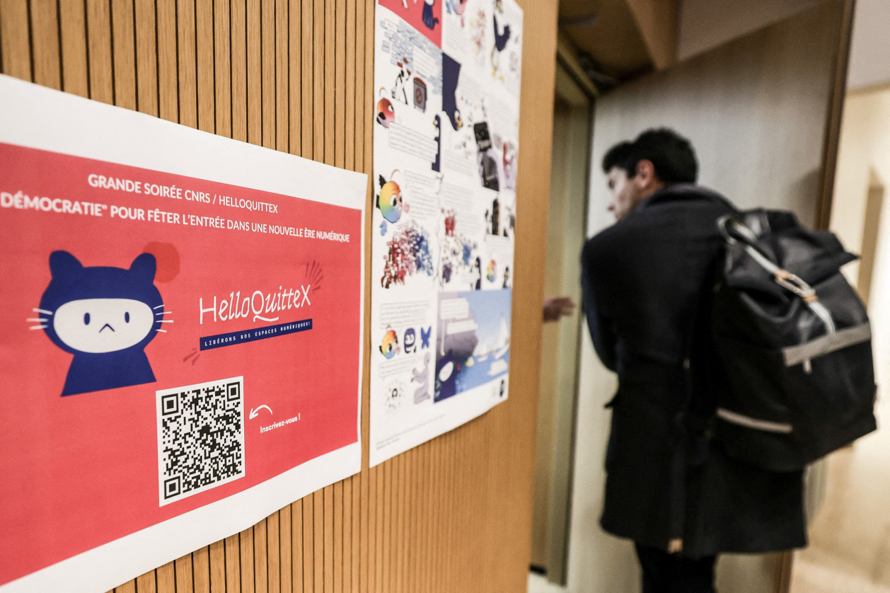 A person arrives to take part in an event in Paris, on January 20, 2025, to celebrate a "new digital era" organized by the collective behind “HelloQuitteX”, an application developed to help users migrate their whole online community from Elon Musk's X to rival social platforms. (AFP/File)