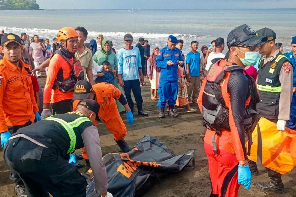 At least four people were dead and dozens unaccounted for on July 3 after a ferry sank on its way to the resort island of Bali, according to local authorities who said 23 survivors had been plucked from the water so far. (AFP)