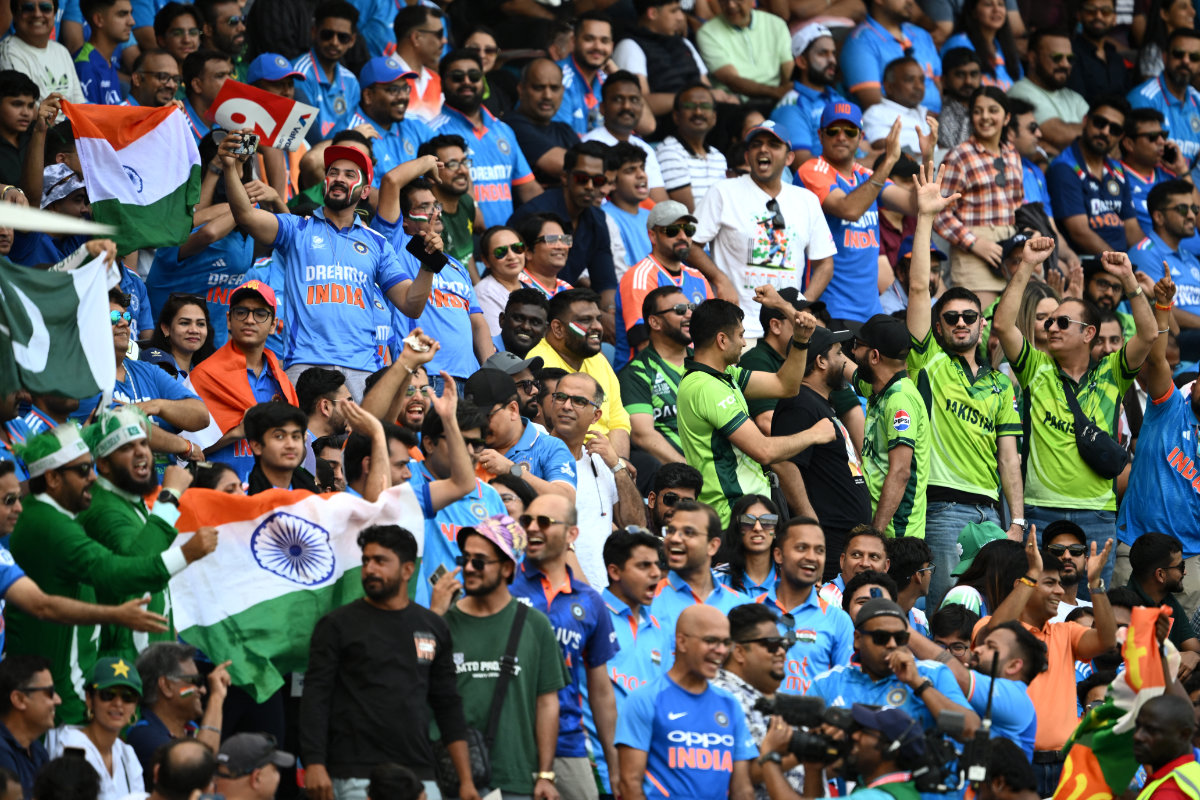 Fans cheer during the ICC Champions Trophy one-day international (ODI) cricket match between Pakistan and India at the Dubai International Stadium in Dubai on February 23, 2025. (AFP/File)