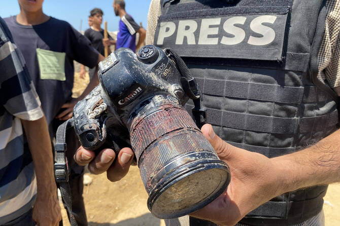 The blood-covered camera belonging to Palestinian photojournalist Mariam Dagga, who was killed in an Israeli strike on Nasser hospital in the southern Gaza Strip last month. (AFP)