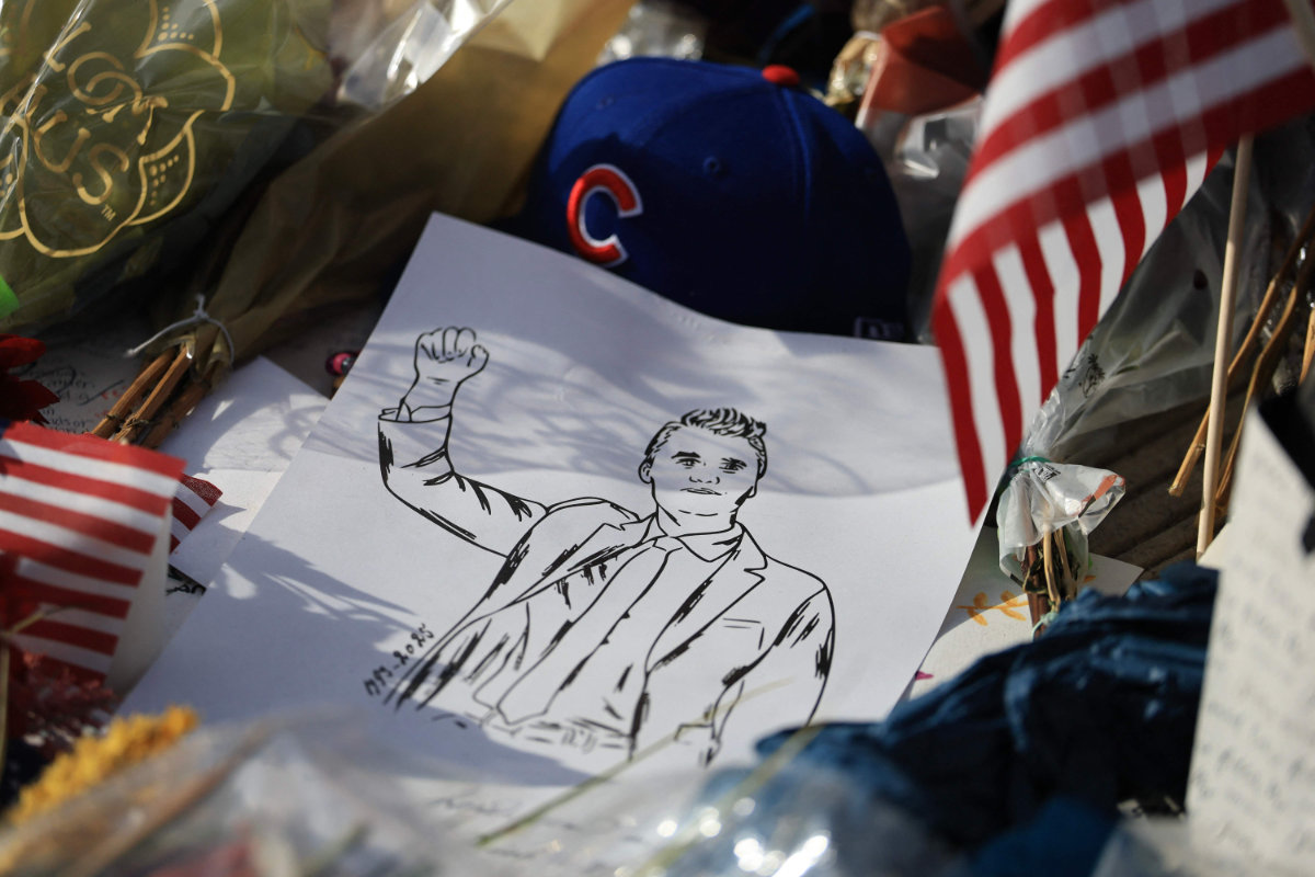 Items are displayed in the makeshift memorial for Charlie Kirk outside the headquarters of Turning Point USA on September 17, 2025, in Phoenix, Arizona. (Getty Images via AFP)