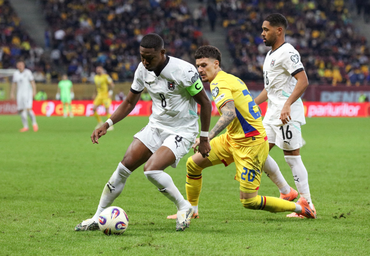 Austria's David Alaba in action with Romania's Dennis Man during their FIFA World Cup qualifying match on Sunday at the Arena Nationala in Bucharest, Romania. (Inquam Photos via REUTERS)