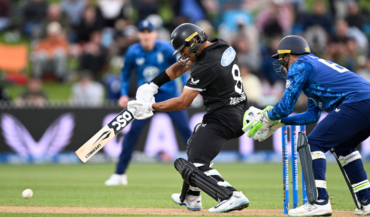 New Zealand’s Rachin Ravindra, left, bats against England during their T20 cricket match in Hamilton, New Zealand on Wednesday. (AP)