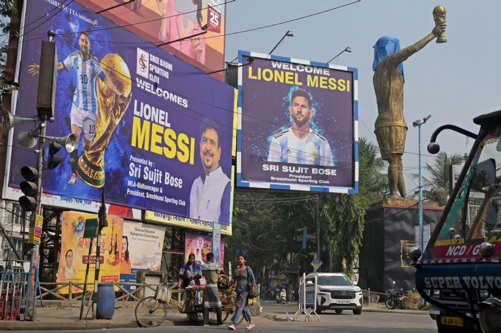 Above, promotional posters and veiled statue of Inter Miami’s Argentine forward Lionel Messi in Kolkata on Dec. 12, 2025. (AFP)