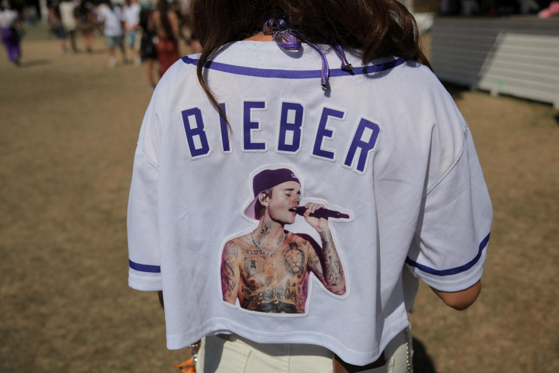 With a minimalist set and a trip through his musical past, pop superstar Justin Bieber returned to the stage on Saturday night to headline the second day of Coachella. (REUTERS)
