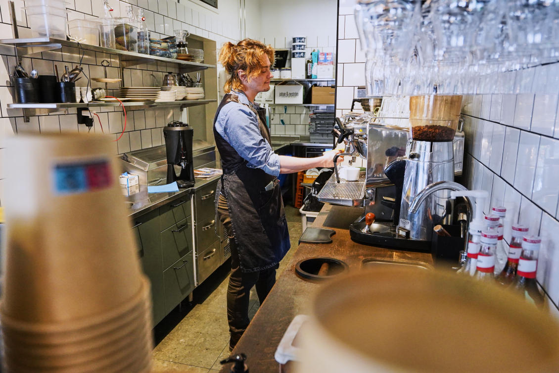 Barista Kajetan Grzelczak makes a coffee at Andon Cafe in Stockholm, Sweden. (AP)