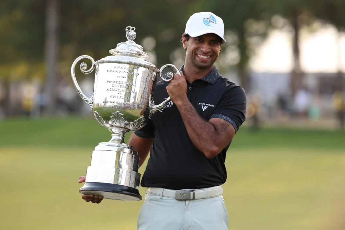 Aaron Rai poses with the trophy after winning the final round of the PGA Championship golf tournament on May 17, 2026, in Newtown Square, Pennsylvania, . (Bill Streicher-Imagn Images)