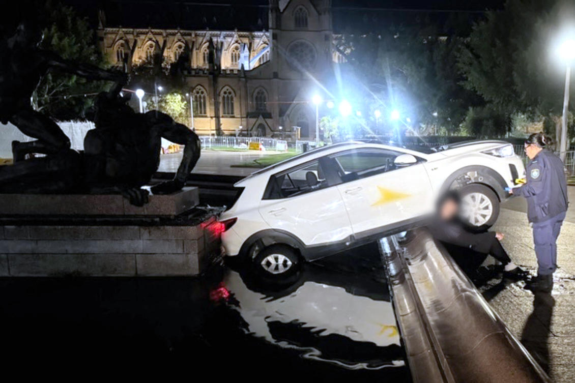 A Frenchman was found still enjoying his McDonald’s meal when police arrested him for allegedly crashing a car into a fountain in Sydney. (New South Wales Police/AFP)