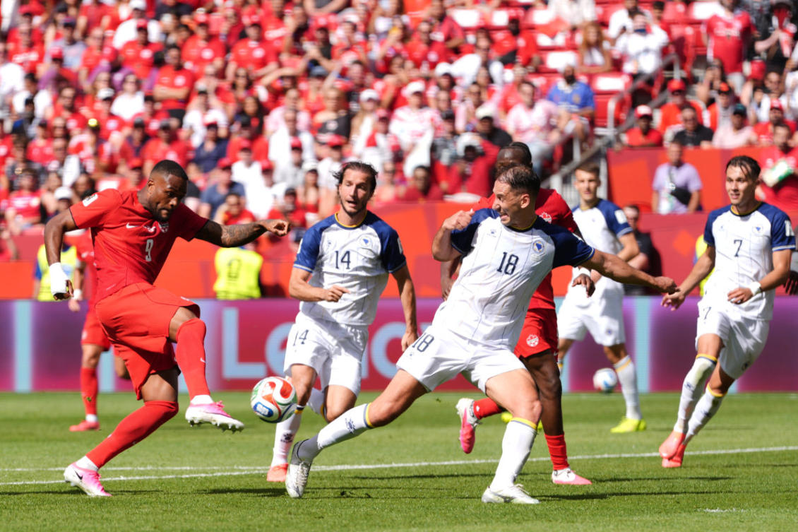 Canada's Cyle Larin (9) scores his sides first goal of the game in the second half of the World Cup Group B soccer match between Canada and Bosnia on June 12, 2026, in Toronto. (AP Photo)