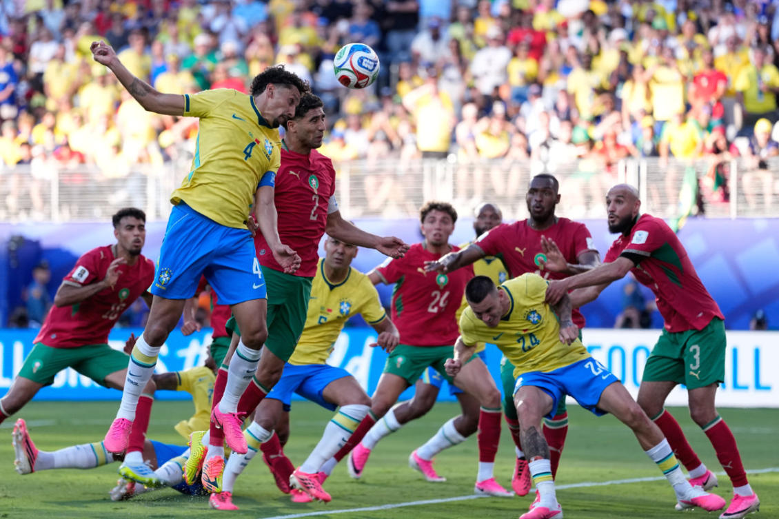 Brazil's Marquinhos, left, and Morocco's Achraf Hakimi jump for the ball during the World Cup Group C soccer match between Brazil and Morocco in East Rutherford, New Jersey, on June 13, 2026. (AP Photo)