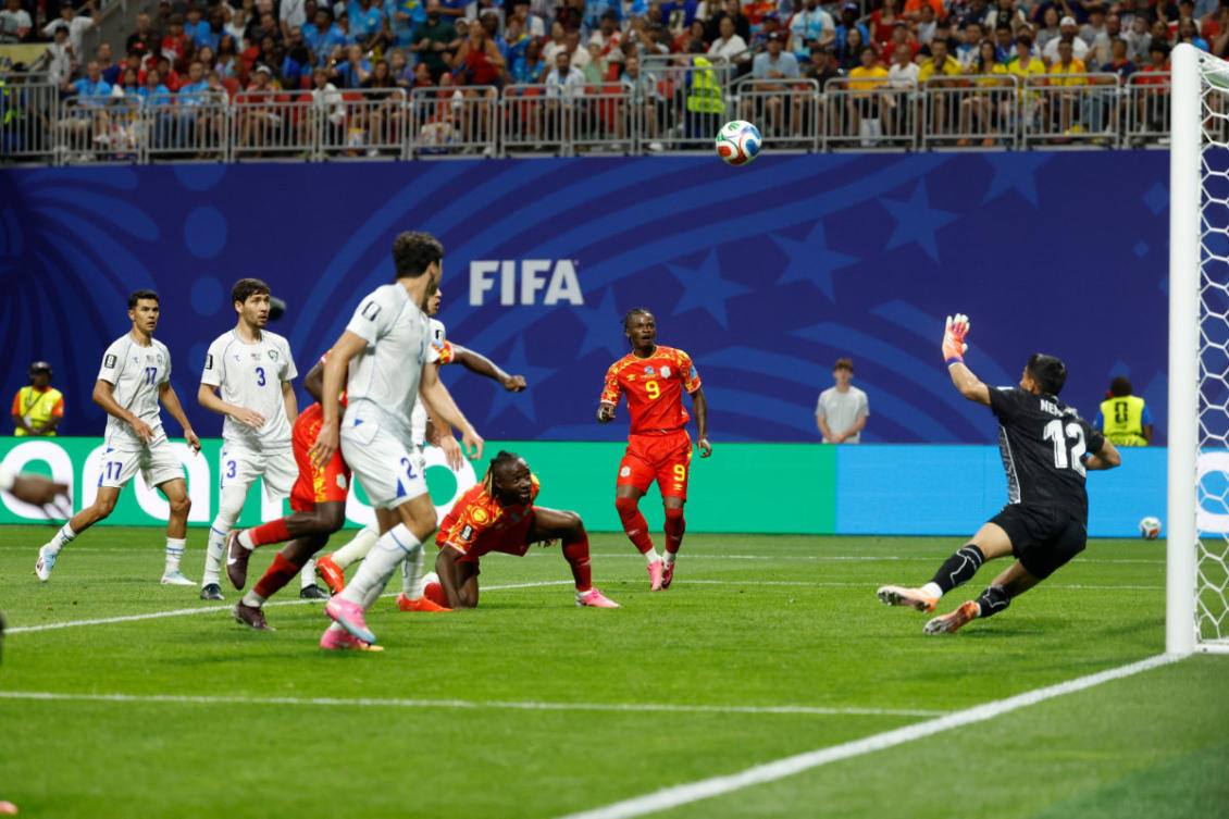Congo's Fiston Mayele (19) and Brian Cipenga (9) watch a missed shot on goal as Uzbekistan goalkeeper Abduvohid Nematov (12) defends during the World Cup Group K soccer match between DR Congo and Uzbekistan in Atlanta on June 27, 2026. (AP