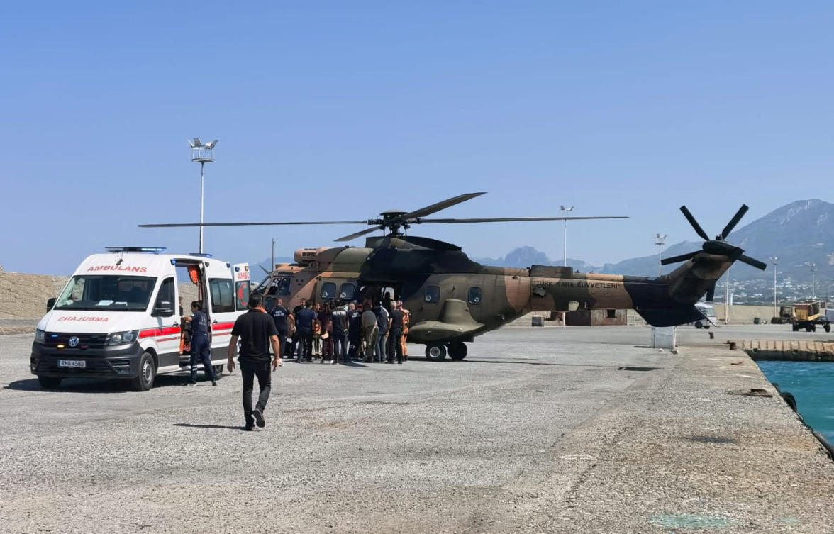 A helicopter brings survivors ashore after they were rescued from the sea following a boat capsize off Kyrenia, northern Cyprus, August 30, 2026. (Reuters/Stringer)