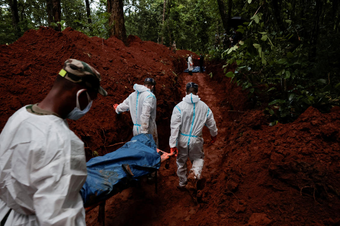 Armed Police Force officers work on transporting bodies to the pit at Devghat mass burial site for victims of deadly flash floods and mudslides in Chitwan, Nepal, August 30, 2026. (Reuters)