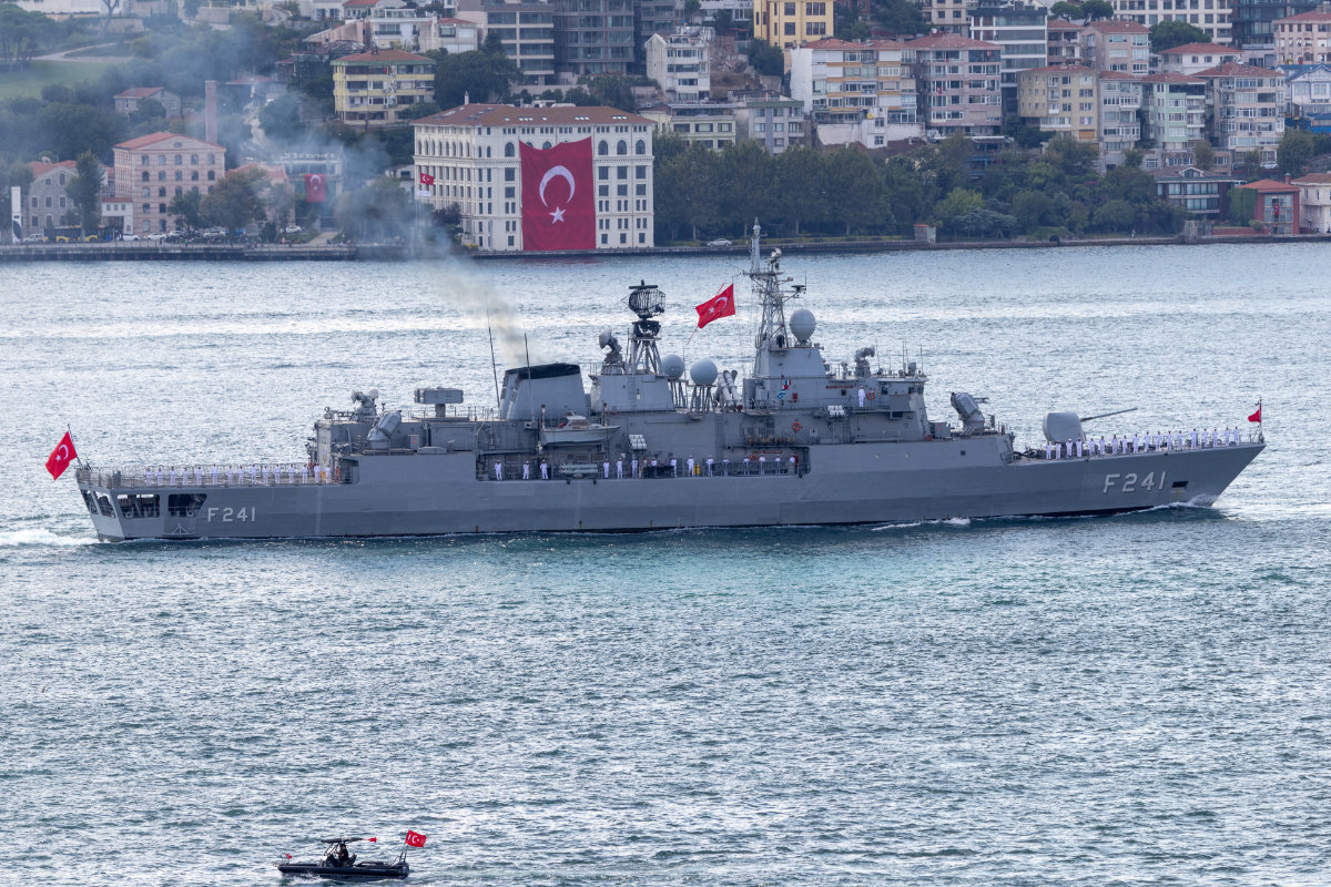 Turkish Navy frigate TCG Turgutreis (F-241) sails in the Bosphorus during a naval parade to mark Victory Day in Istanbul. (Reuters)