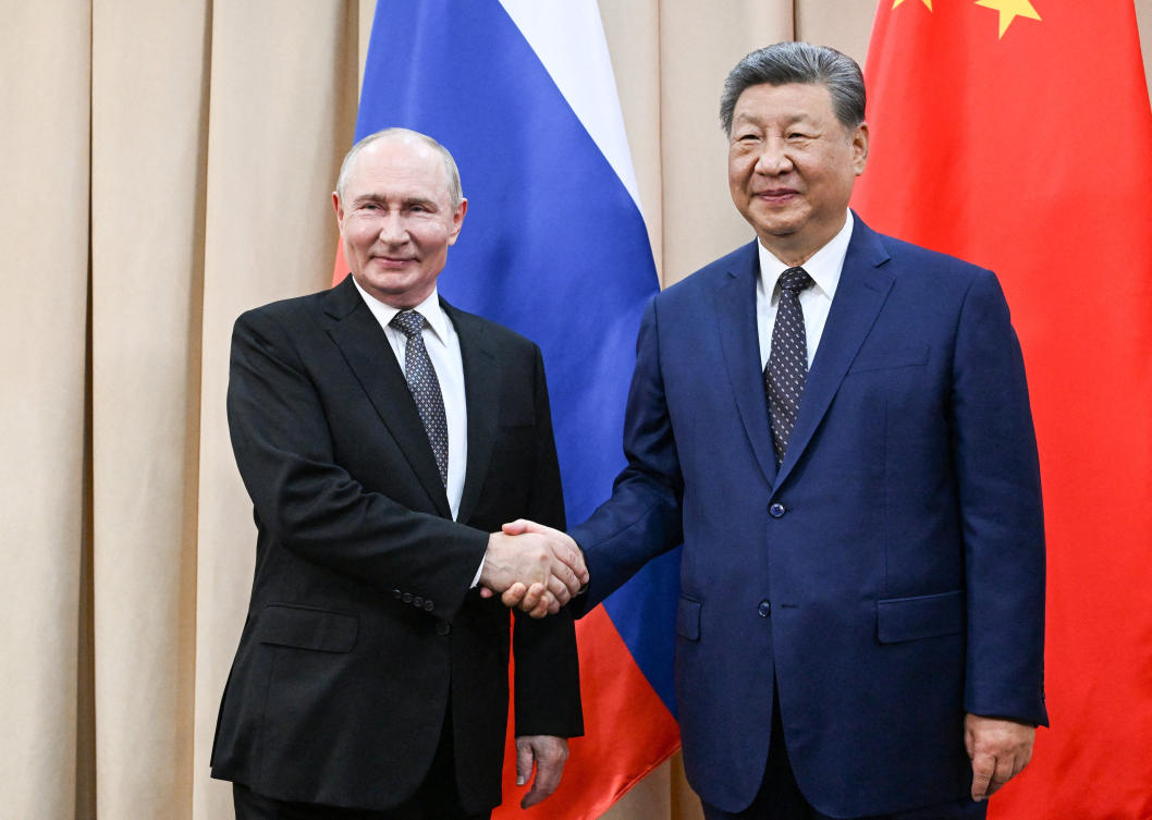 Russian President Vladimir Putin and Chinese President Xi Jinping shake hands during a meeting on the sidelines of the Shanghai Cooperation Organisation summit in Bishkek, Kyrgyzstan, August 31, 2026. (Reuters)