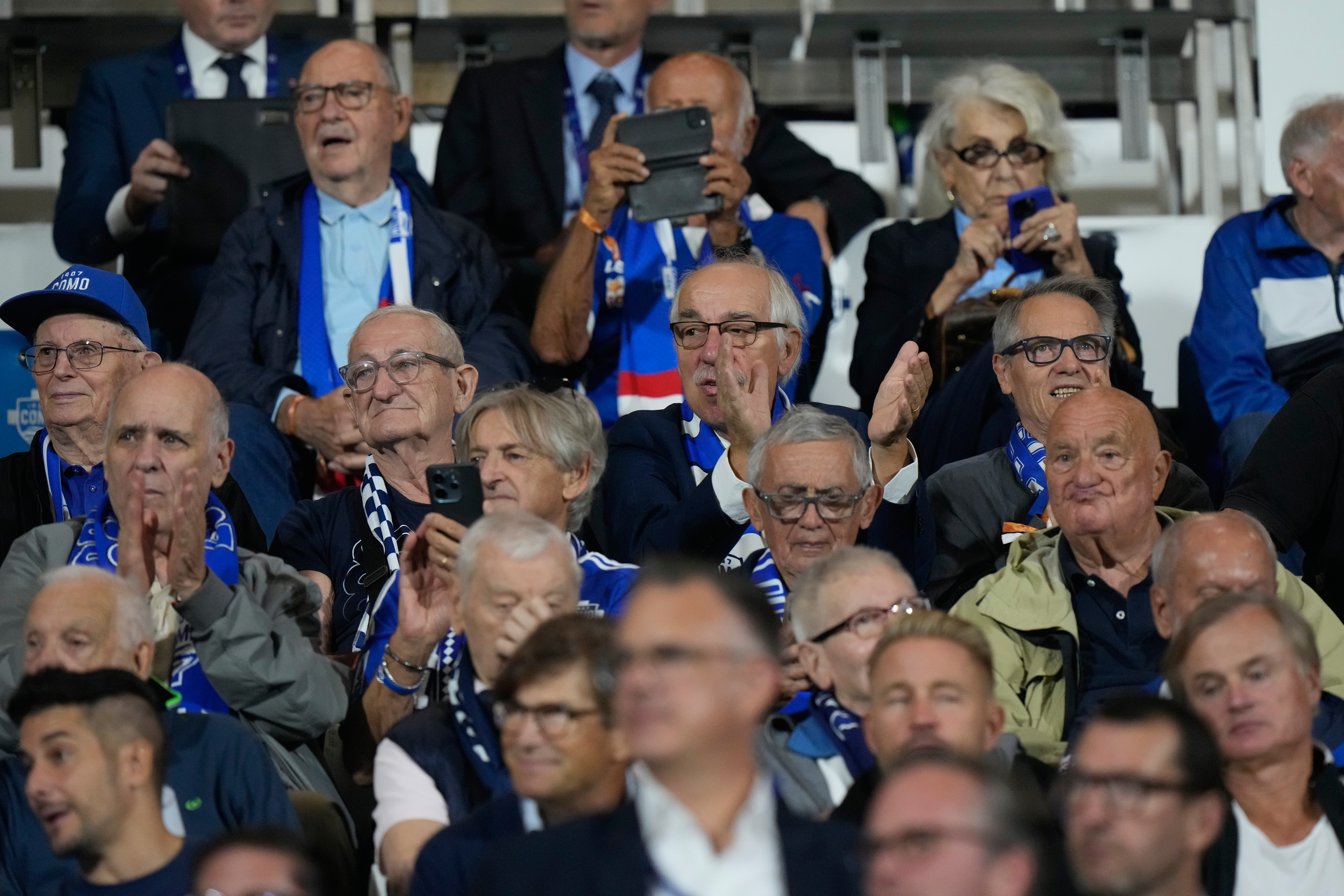 Italian team Como welcome older fans to the stadium for their UCL debut