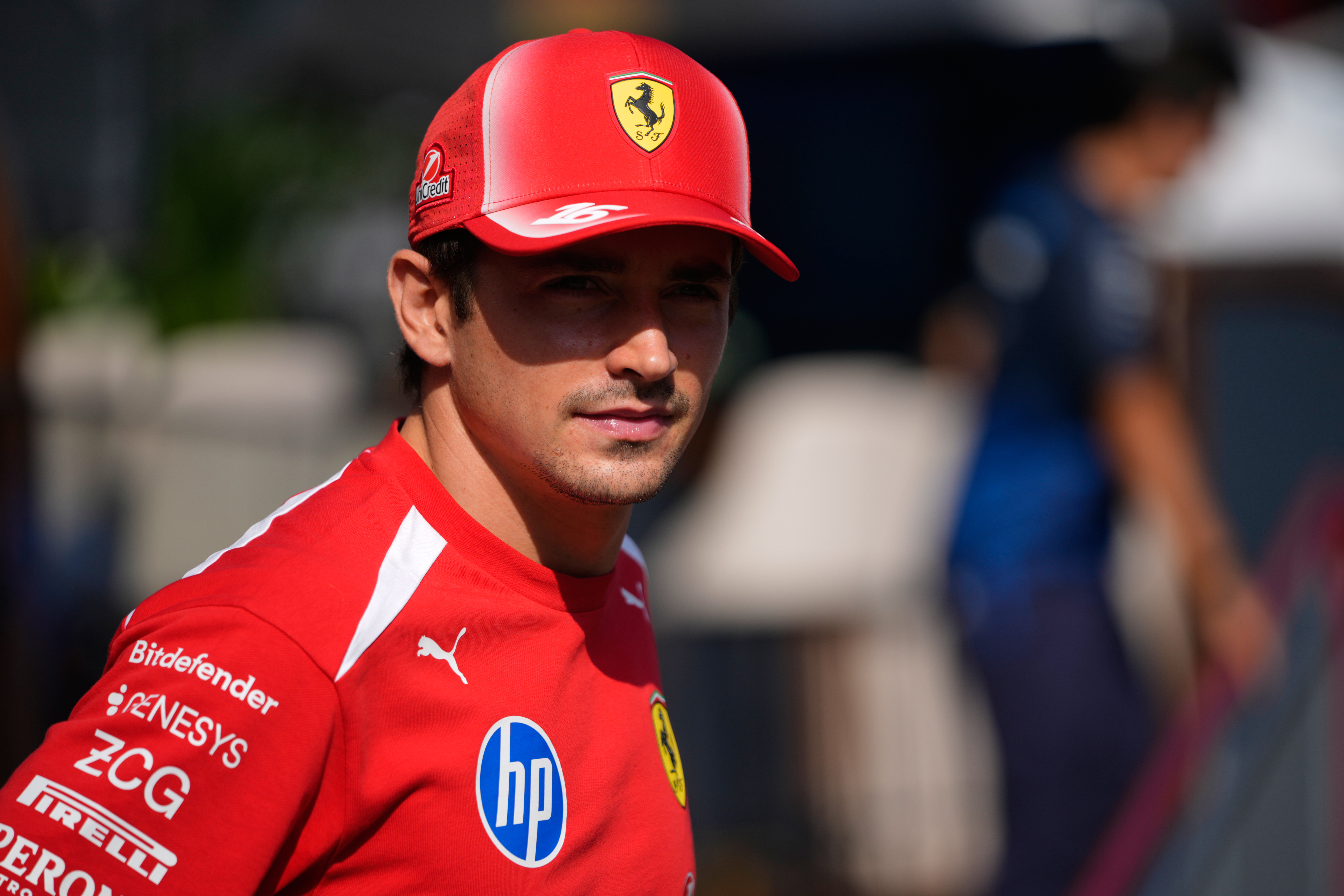 Ferrari driver Charles Leclerc of Monaco walks through the paddock ahead of the Formula One Azerbaijan Grand Prix in Baku, Azerbaijan, Wednesday, Sept. 23, 2026. (AP Photo/Pavel Bednyakov)