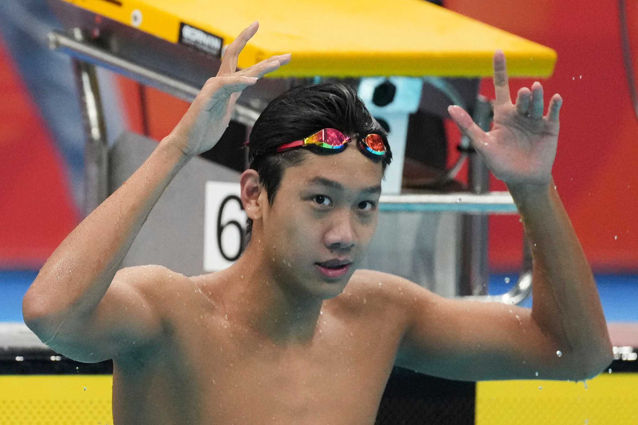 Chinese swimmer Zhang Zhanshuo completes sweep of seven gold medals at the Asian Games