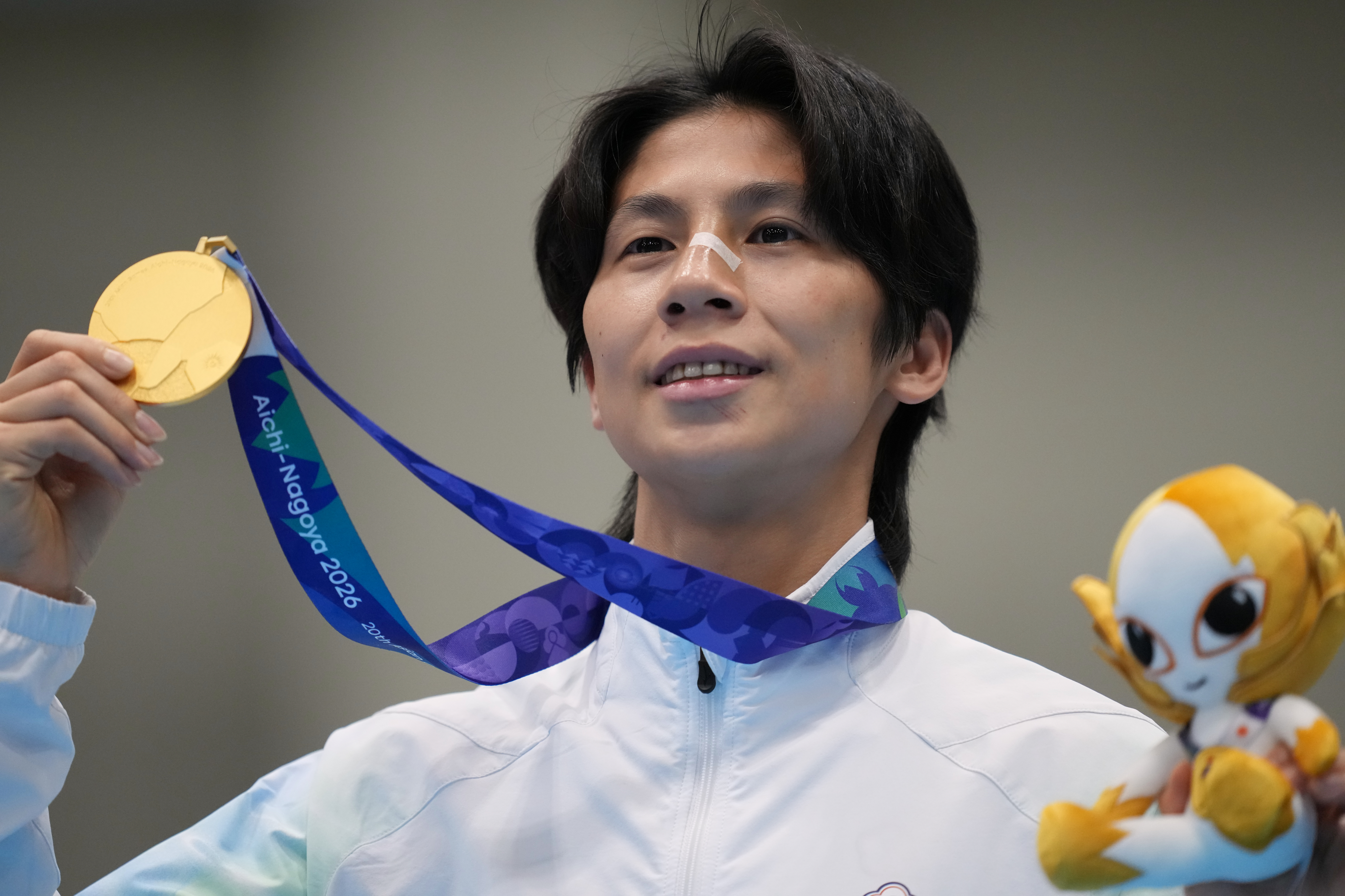 Taiwan boxer Lin wins gold as virtual taekwondo makes Games debut