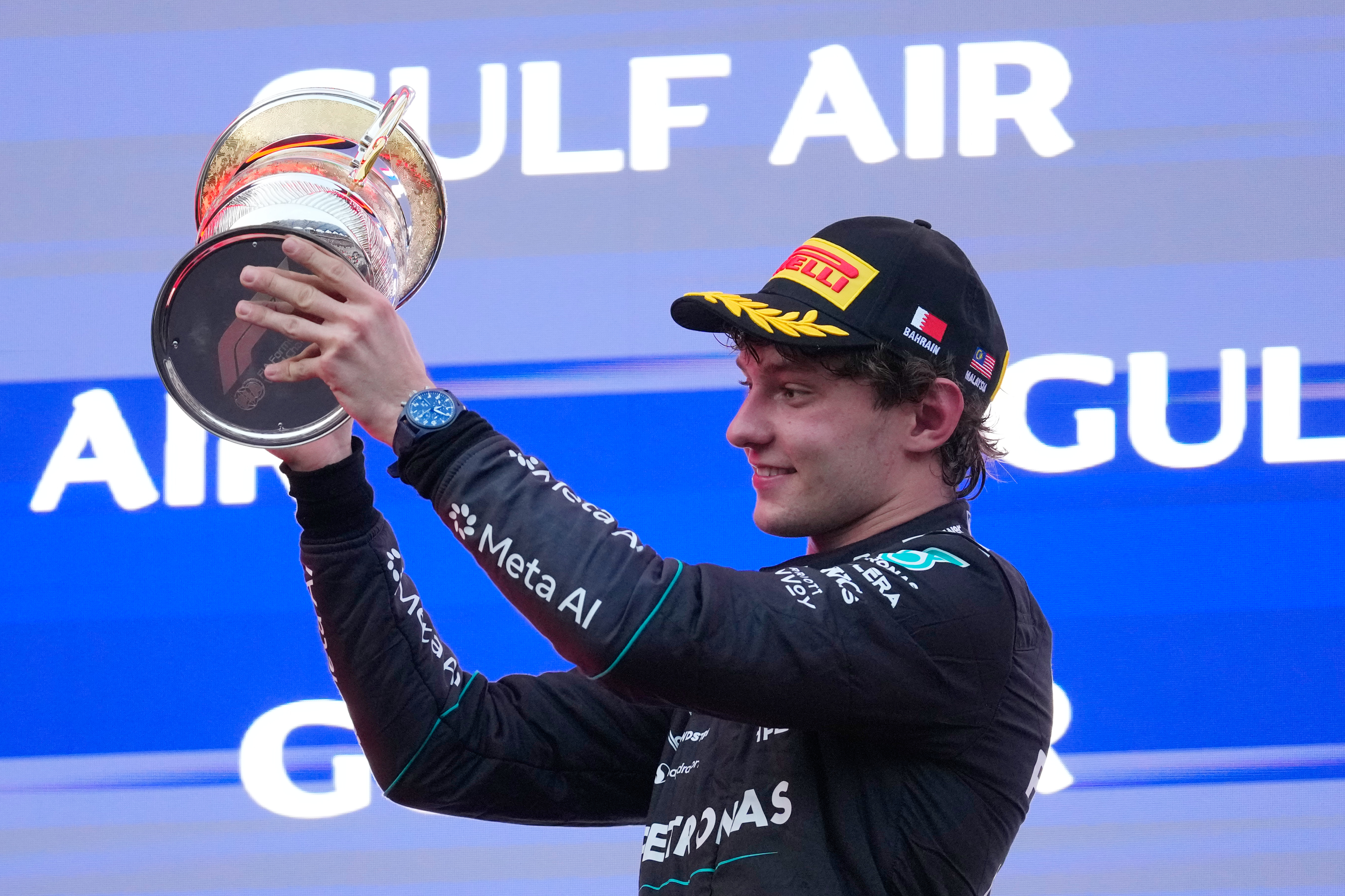 Mercedes driver Andrea Kimi Antonelli of Italy celebrates his second place on the podium the Bahrain Grand Prix in Sepang, Malaysia, Sunday, Oct. 4, 2026. (AP Photo/Vincent Thian)