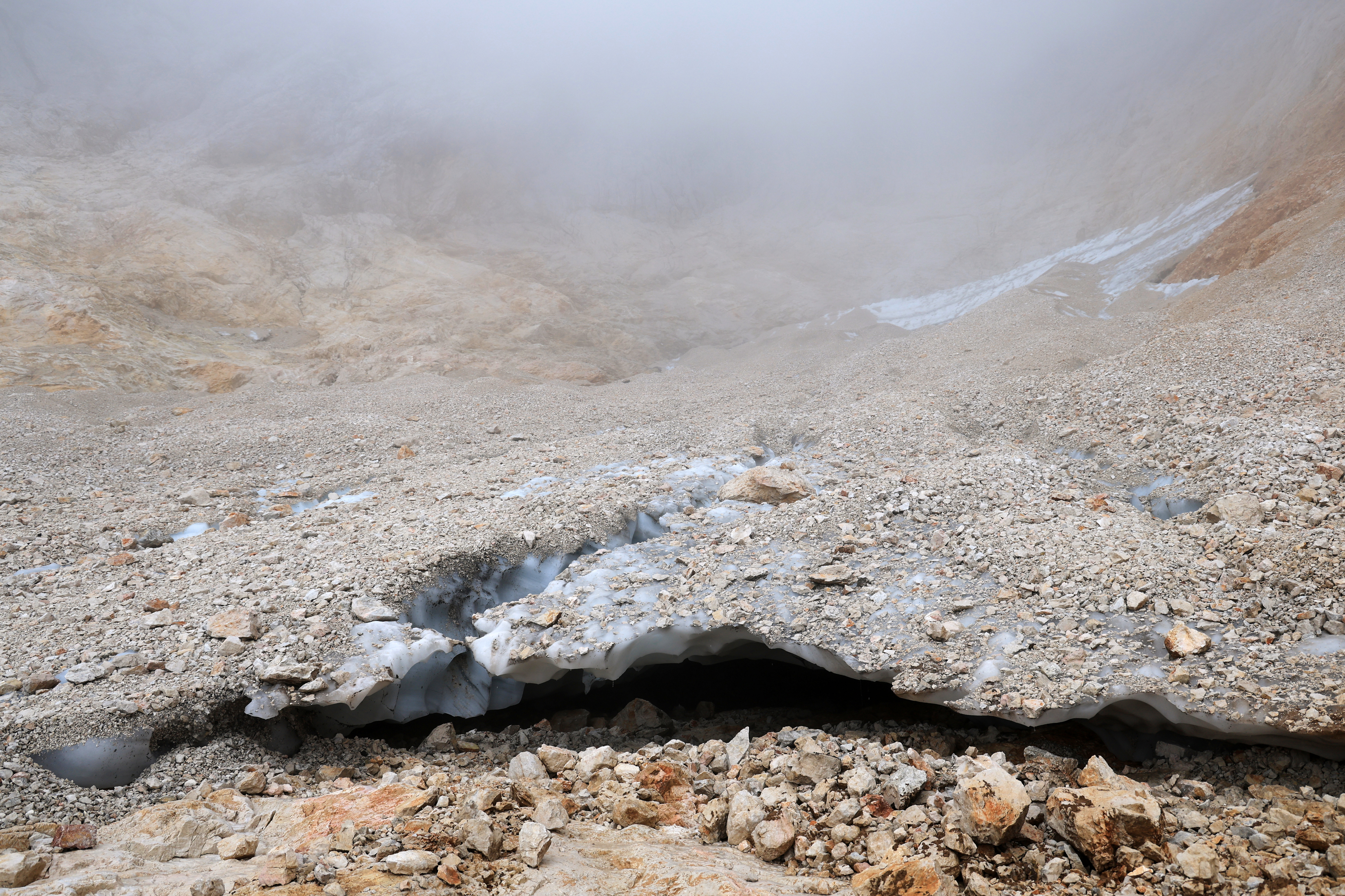 Heat, scarce snow melting away Slovenia’s Alpine glaciers