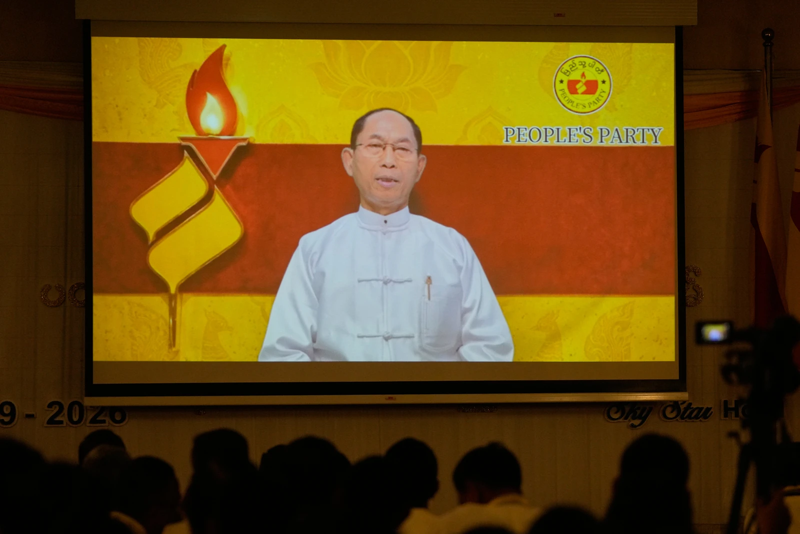 Ko Ko Gyi, a leader of Myanmar prominent 1988 pro-democracy uprising and the People's Party leader, delivers video messages during the party's conference and central committee meeting at a hotel Saturday, Sept. 12, 2026, in Yangon, Myanmar. (AP Photo/Thein Zaw)