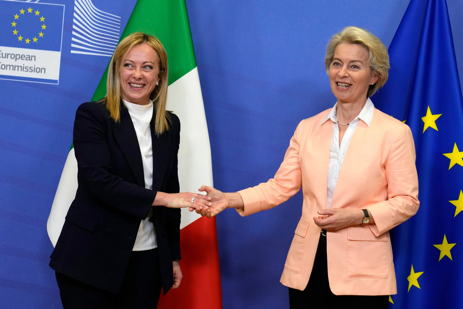 European Commission President Ursula von der Leyen, right, greets Italian Prime Minister Giorgia Meloni at EU headquarters in Brussels in 2022. (AP/File Photo) (AP Photo/Virginia Mayo)